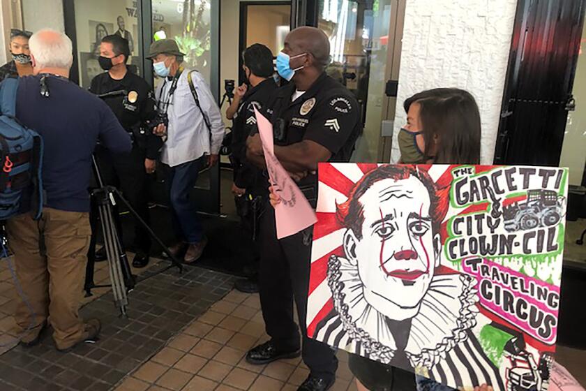 Protesters disrupted the celebration of a new office space for a city dept that will investigate human rights complaints.