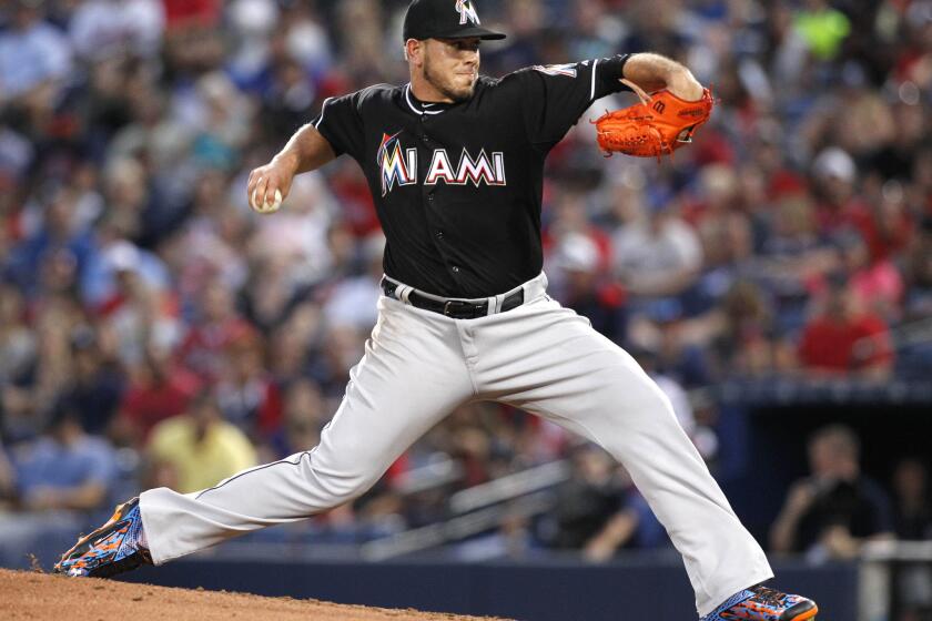 Marlins starting pitcher Jose Fernandez delivers a pitch against the Braves on Friday in Atlanta.