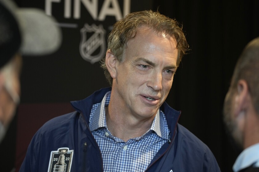Colorado Avalanche general manager Joe Sakic talks to reporters during media day before Game 1 of the NHL hockey Stanley Cup Finals against the Tampa Bay Lightning Tuesday, June 14, 2022, in Denver. (AP Photo/David Zalubowski)