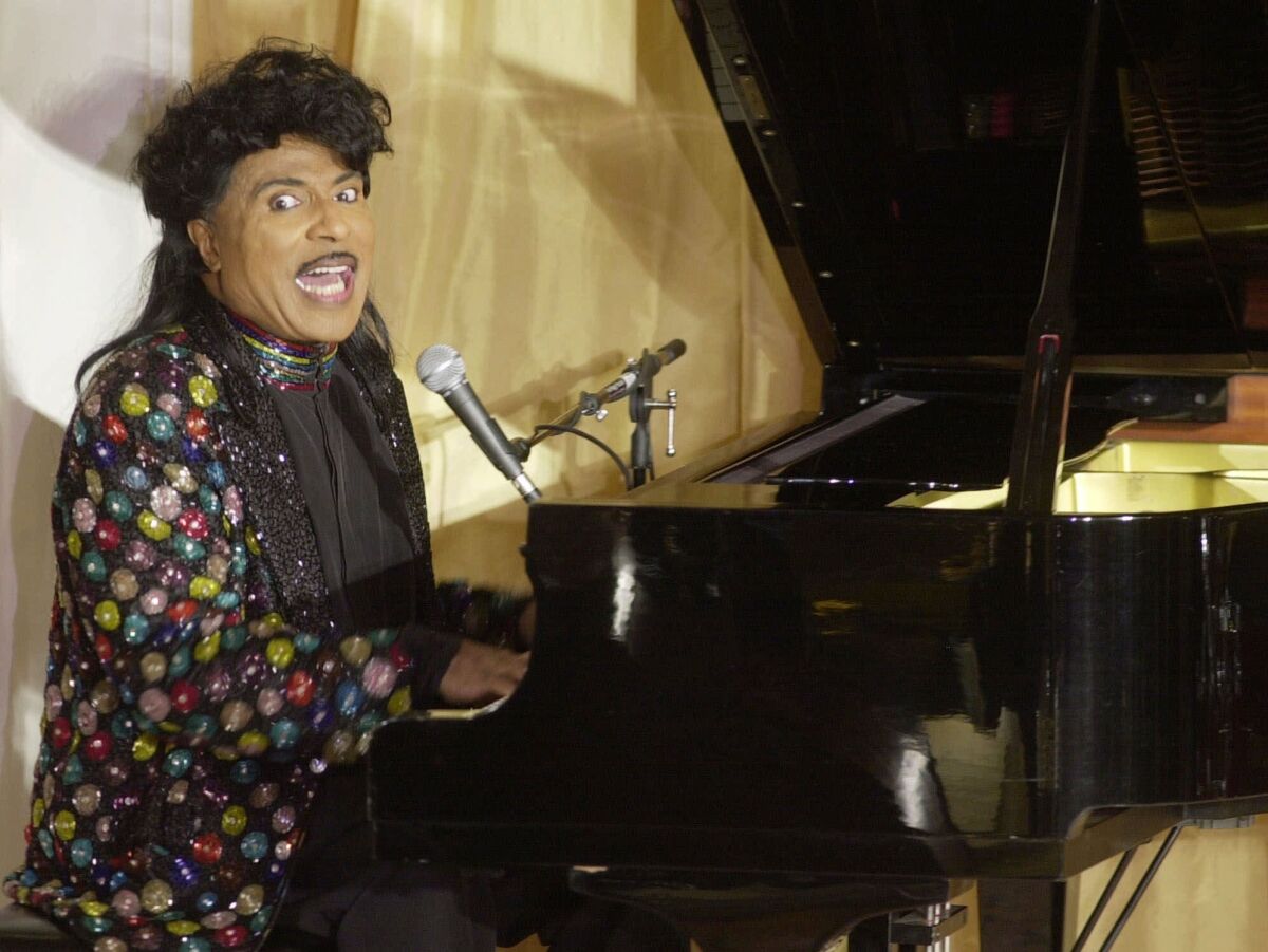 In this July 22, 2001 file photo, Little Richard performs at the 93rd birthday and 88th year in show business gala celebration for Milton Berle, in Beverly Hills, Calif. Little Richard, the self-proclaimed “architect of rock ‘n’ roll” whose piercing wail, pounding piano and towering pompadour irrevocably altered popular music while introducing black R&B to white America, has died Saturday, May 9, 2020.