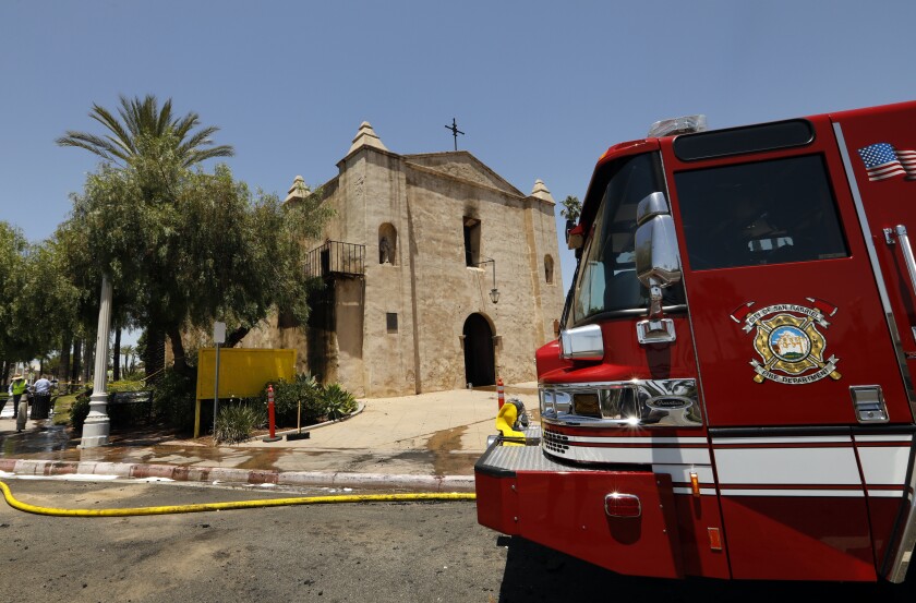 A firetruck outside the San Gabriel Mission after the blaze.