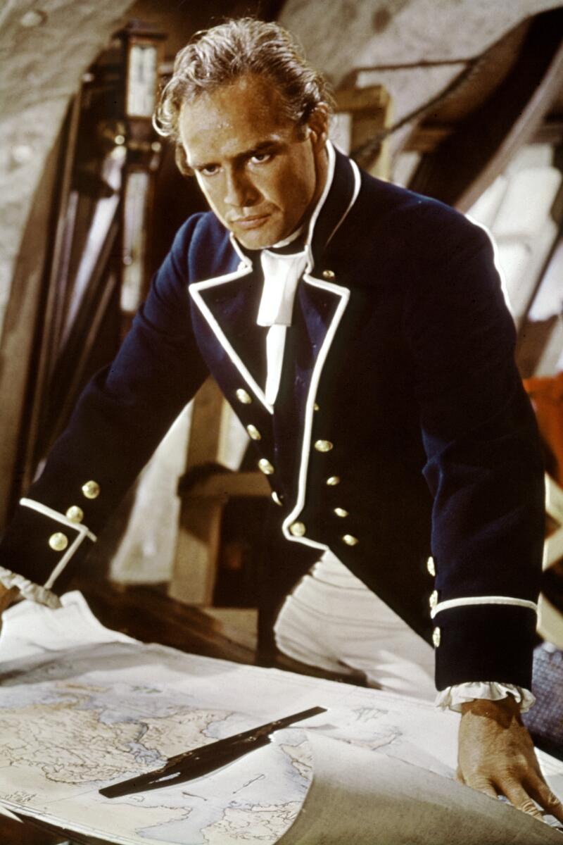 Marlon Brando in naval costume, looking serious