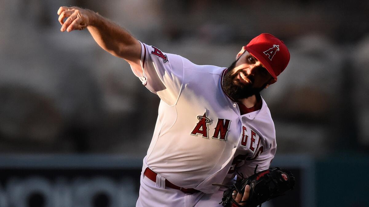 Angels starter Matt Shoemaker delivers a pitch during the team's 5-2 victory over the Texas Rangers on Sunday.
