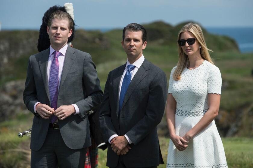 (FILES) This file photo taken on June 24, 2016 shows the children of Republican presidential-elect Donald Trump, Ivanka Trump (R), Donald Trump Jr. (C) and Eric Trump, at the official opening of his Trump Turnberry hotel and golf resort in Turnberry, Scotland. Donald Trump shook up his White House transition team Friday by appointing running mate Mike Pence as its chairman and naming a cohort of Washington insiders -- along with three of his children -- to the operation.It marked a clear shift by Trump to tap into the very establishment that he railed so strongly against during his abrasive presidential campaign that culminated Tuesday in his shock election win over Democrat Hillary Clinton. Three of Trump's grown children -- Don Jr, Eric and Ivanka -- and son-in-law Jared Kushner were also named to the team's executive committee, a move that could raise serious questions about conflicts of interest. / AFP PHOTO / OLI SCARFFOLI SCARFF/AFP/Getty Images ** OUTS - ELSENT, FPG, CM - OUTS * NM, PH, VA if sourced by CT, LA or MoD **