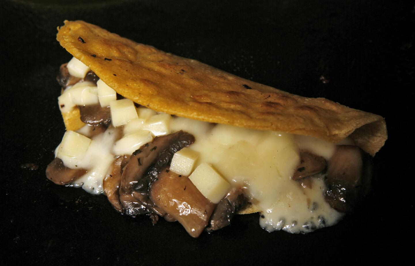 Quesadillas stuffed with mushrooms and goat cheese