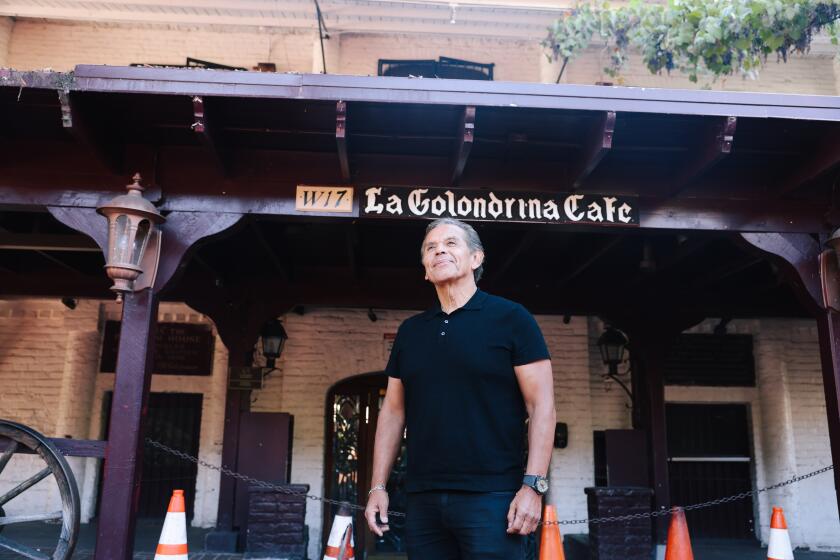 Los Angeles, CA - November 14: Antonio Villaraigosa, who served as the 41st Mayor of Los Angeles from 2005 to 2013, poses for a portrait in front of the closed La Golondrina Cafe in Olvera Street on Tuesday, Nov. 14, 2023 in Los Angeles, CA. (First Name Last Name / Los Angeles Times)