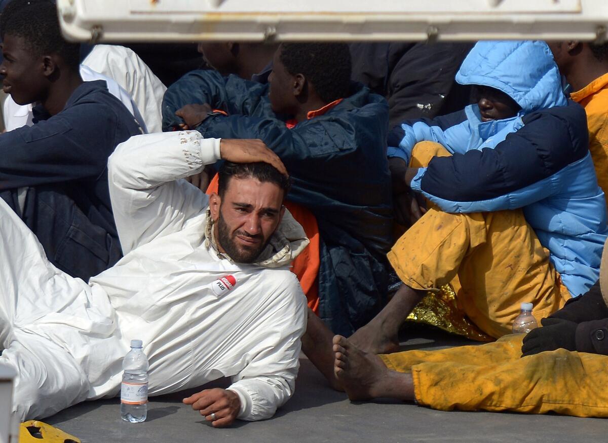 Tunisian national Mohammed Ali Malek, the alleged captain of the boat that overturned off the coast of Libya, sits on board an Italian Coast Guard vessel in Malta. The event was the Mediterranean's deadliest disaster in decades, with an estimated 800 deaths.