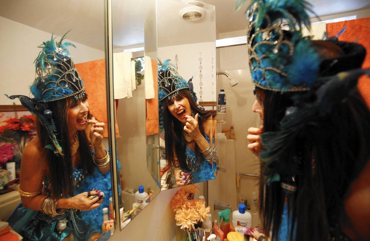 Nancy Urbach, also known as the belly dancer Narayana, prepares for her role as queen of Saturday's 37th Occasional Pasadena Doo Dah Parade. She has shimmied, sashayed and snaked her way down Colorado Boulevard every Doo Dah since it began in 1978 -- and now she's finally queen.