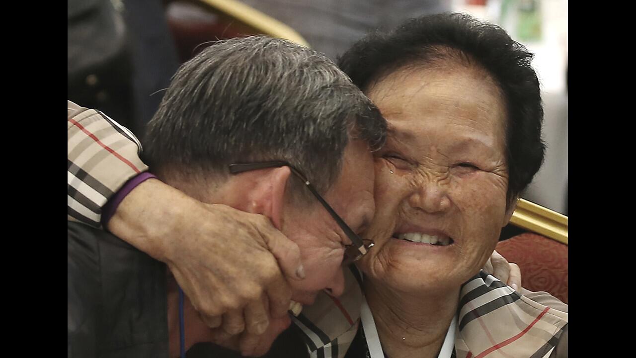 North Korean Lim Ok Rye, 82, right, meets with her South Korean family member Lim Choong-hwan, 72, during a family reunion at Diamond Mountain resort in North Korea, on Oct. 20, 2015.