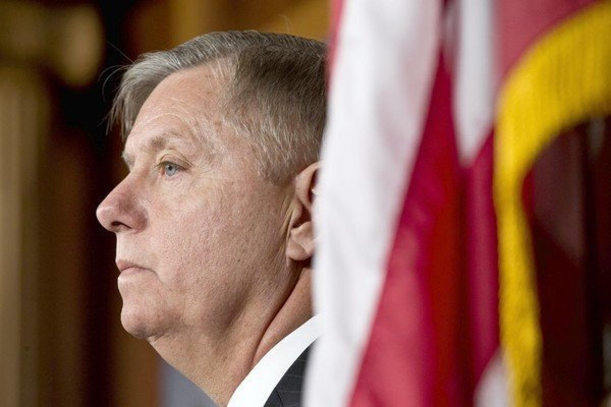 Sen. Lindsey Graham, a South Carolina Republican, was attacked in an election ad for supporting immigration reform. A left-leaning group backed him up by giving money for an ad to a Republican super PAC.