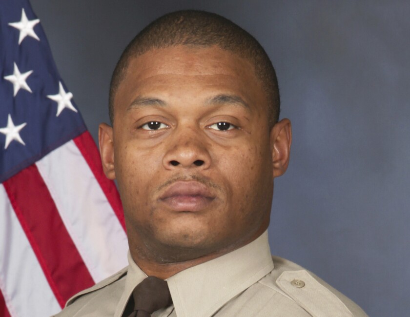 This photo provided by St. Louis County Police Department shows Detective Antonio Valentine. The St. Louis County police detective died in the line of duty and a suspect he was trying to stop also died in a head-on collision of their vehicles. The crash happened Wednesday, Dec. 1, 2021, in north St. Louis County after officers with the department’s drug unit tried to stop a car that had been reported stolen, police said. (St. Louis County Police Department via AP)