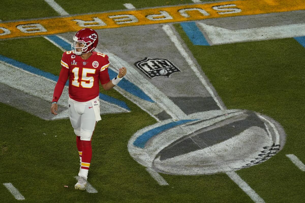 Kansas City Chiefs quarterback Patrick Mahomes walks to the huddle during Super Bowl LV.
