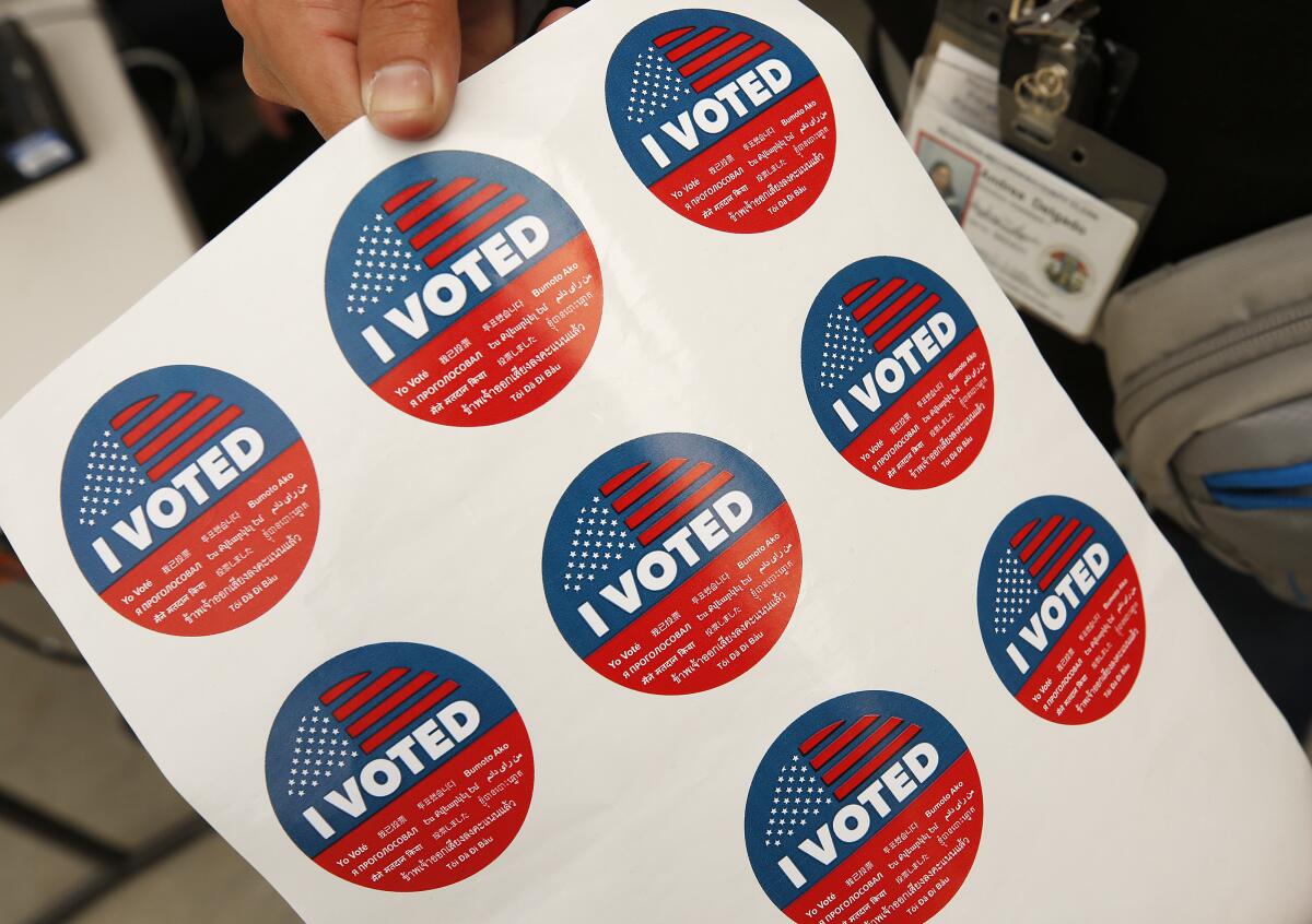 A sheet of red and blue "I Voted" stickers