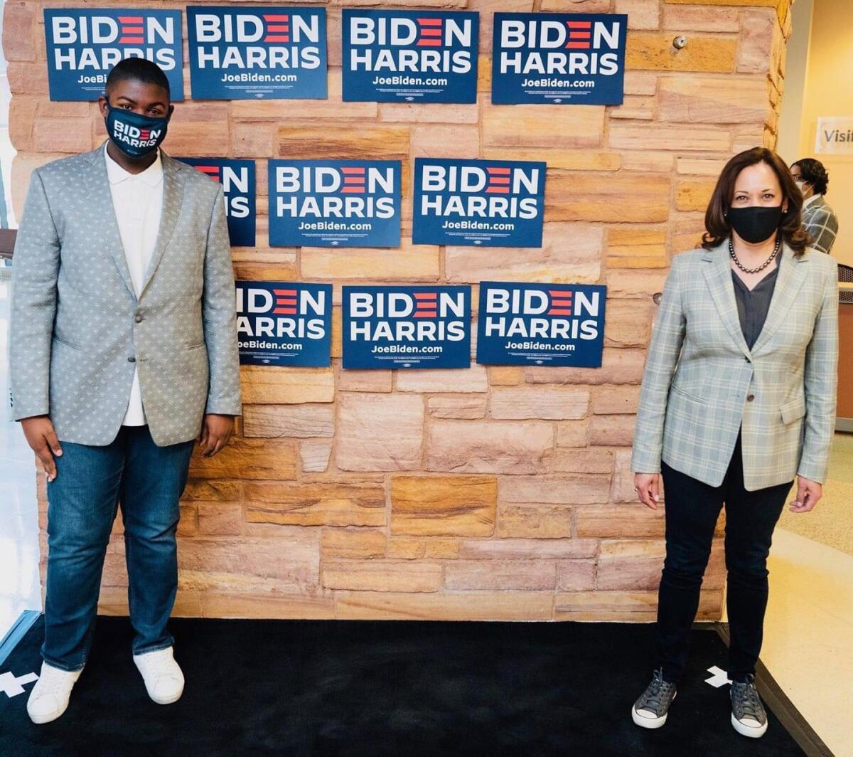 Christian Shelton and Kamala Harris stand at a Democratic voter registration event in Las Vegas.