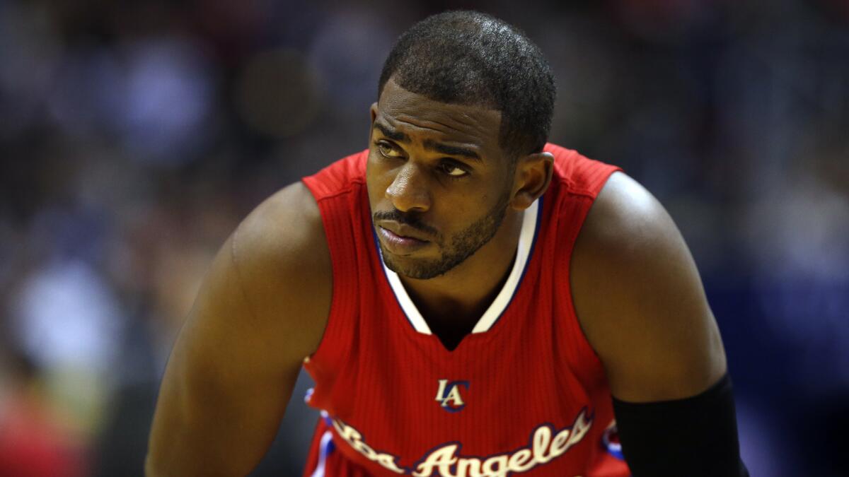 Clippers point guard Chris Paul looks on during a 104-96 loss to the Washington Wizards on Friday.
