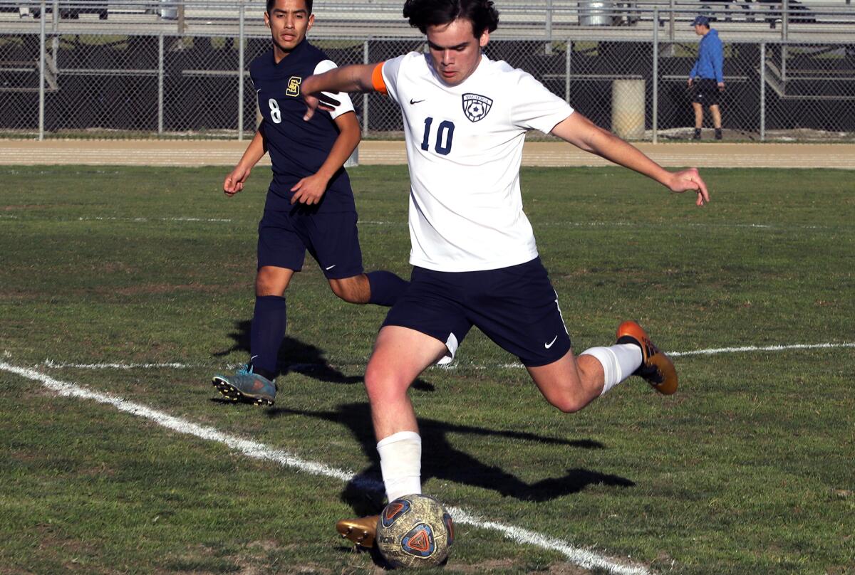 Pacifica Christian's Ian Cross (10) sends the ball down the field against South El Monte on Tuesday.
