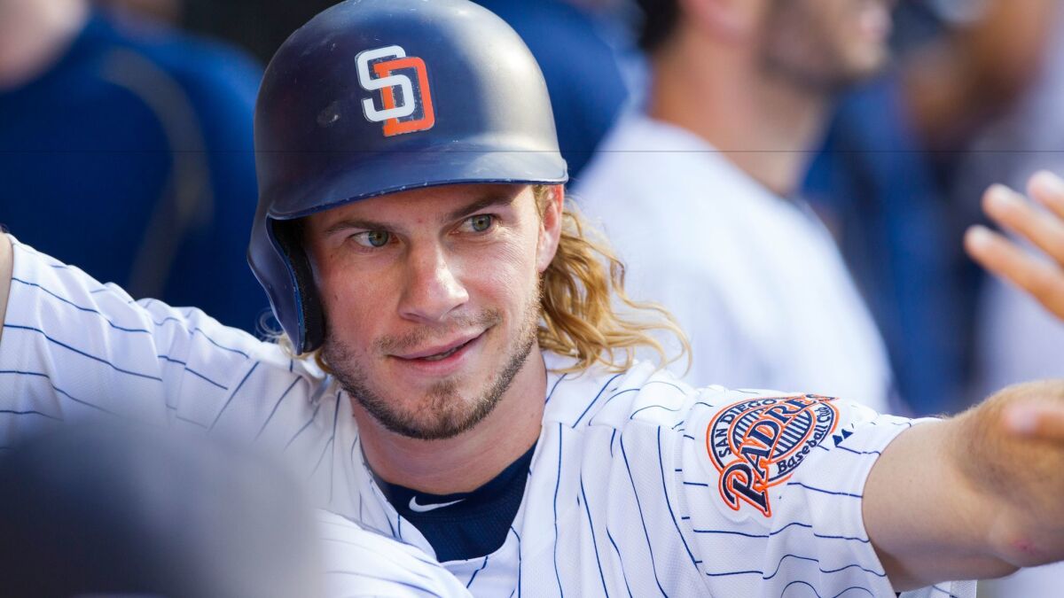 Padres center fielder Travis Jankowski smiles in the dugout after scoring on a single by Yangervis Solarte in the first inning on Aug. 6, 2016.