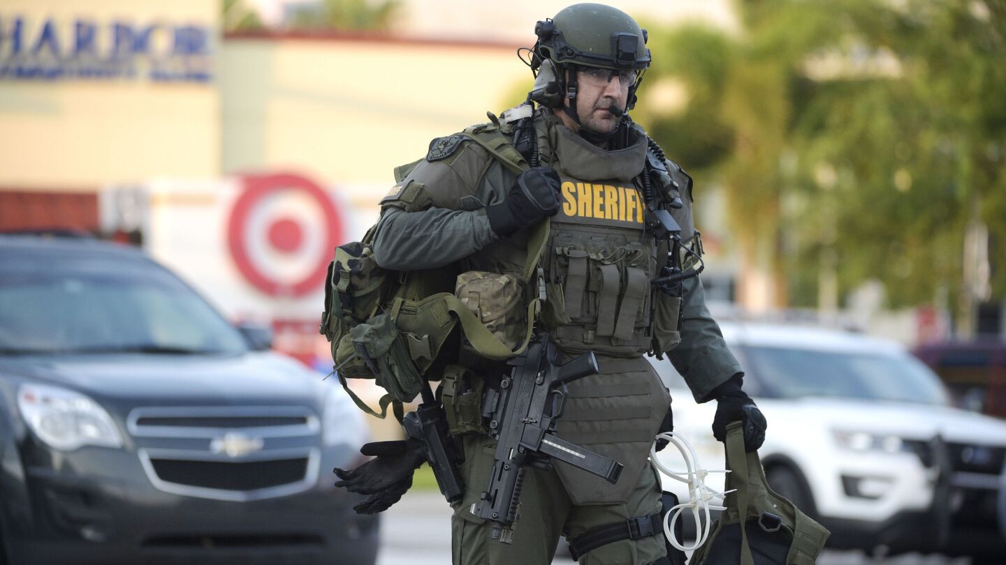 An Orange County (Fla.) Sheriff's Department SWAT member arrives at Pulse nightclub.