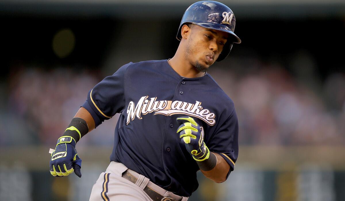 Brewers shortstop Jean Segura rounds the bases after hitting his second home run against the Colorado Rockies during a game last month in Denver.