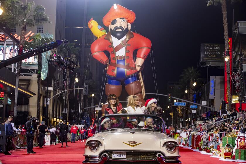 HOLLYWOOD, CA - November 28 2021: A four-story high pirate makes its way down Hollywood Blvd. at the 89th Annual Hollywood Christmas Parade on Sunday, Nov. 28, 2021 in Hollywood, CA. (Brian van der Brug / Los Angeles Times