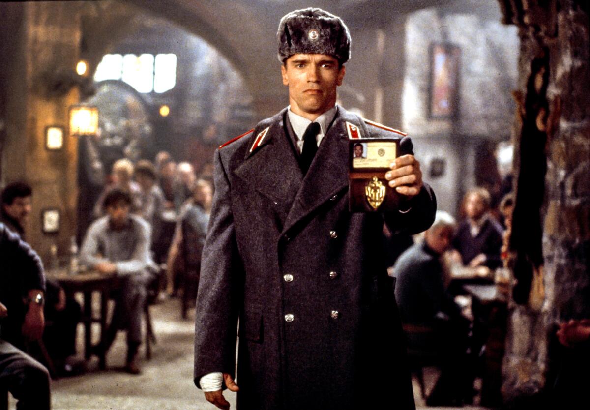 Arnold Schwarzenegger shows his badge in a scene from "Red Heat"