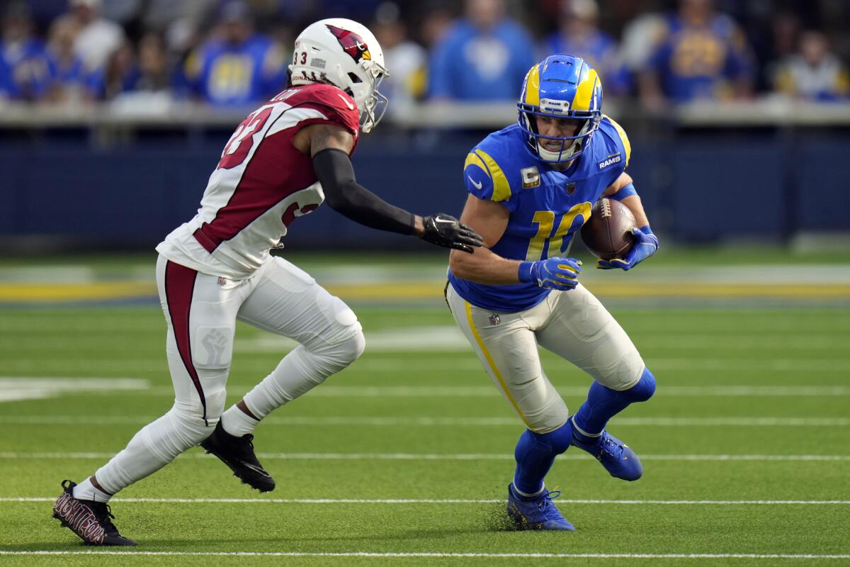 Rams wide receiver Cooper Kupp runs after making a catch against the Arizona Cardinals.