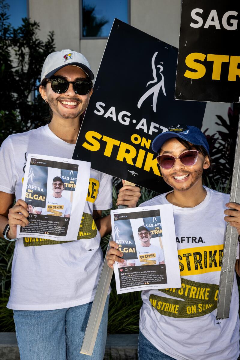 Abby Rizo, left and Mika Dyo came dressed as actor Pedro Pascal, based on a photo of Pascal himself picketing.