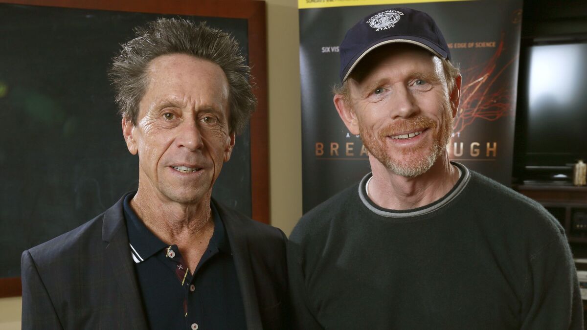 Producer Brian Grazer, left, and director Ron Howard will make a documentary about the aftermath of the deadly California wildfires with National Geographic Documentary Films.