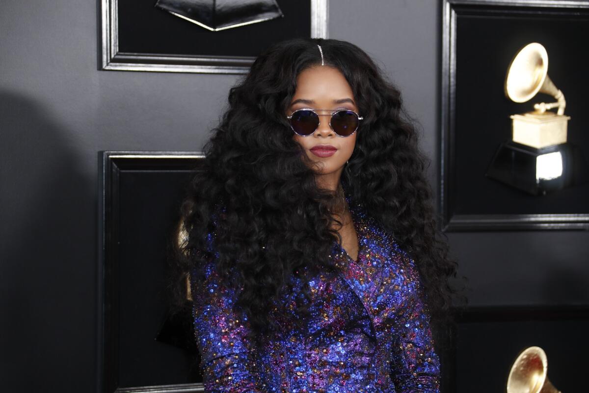 H.E.R. during the arrivals at the 61st Grammy Awards.