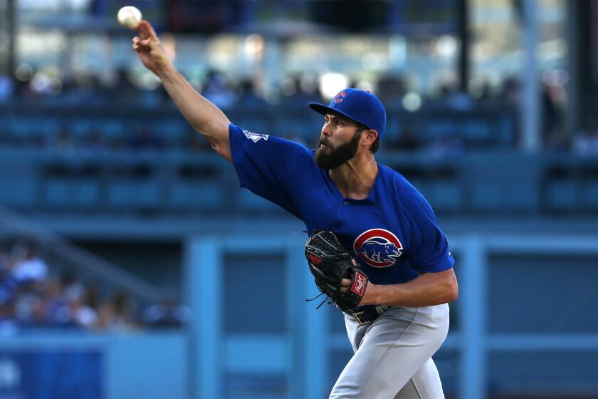 Cubs starting pitcher Jake Arrieta delivers against the Dodgers at Dodger Stadium on Aug. 30.