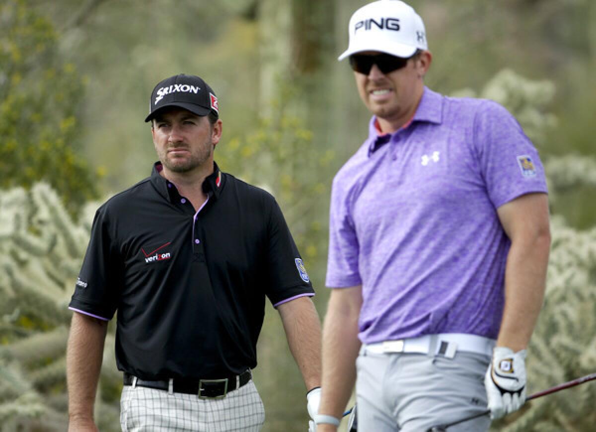 Graeme McDowell, who has never led any of his matches until the clinching a win, watches the drive of opponent Hunter Mahan at No. 17 on Friday during the third round of the Match Play Championship.
