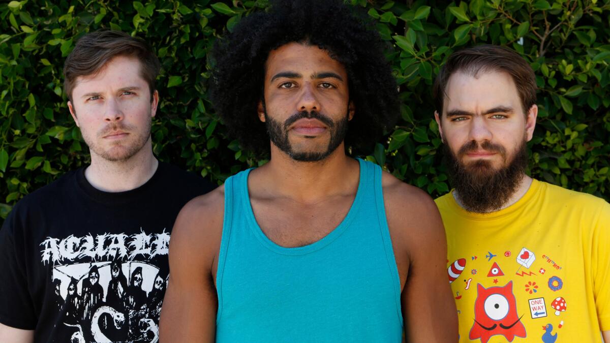Daveed Diggs, center, with William Hutson, left, and Jonathan Snipes.