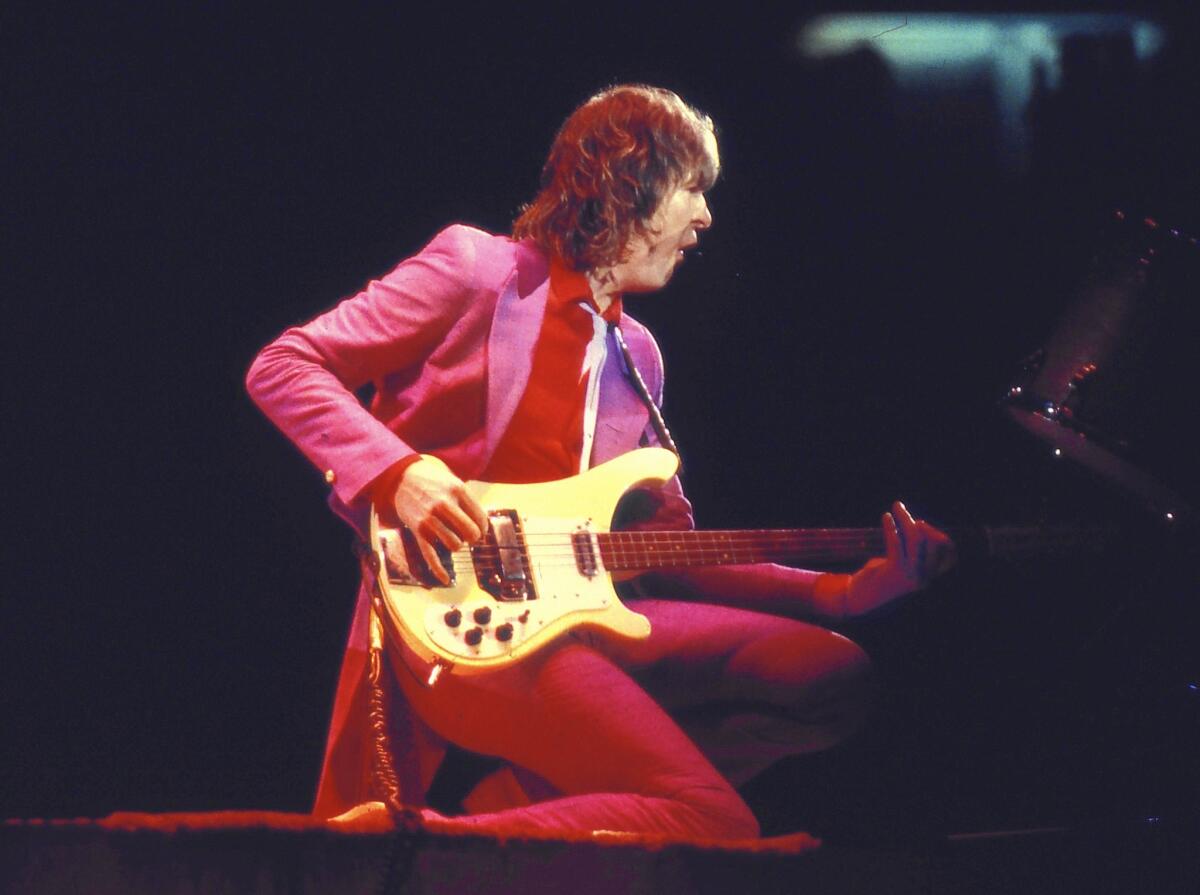 Chris Squire performs with Yes at a concert in Champaign, Ill., in 1979. Squire was the only member of the band to play on every one of its albums.