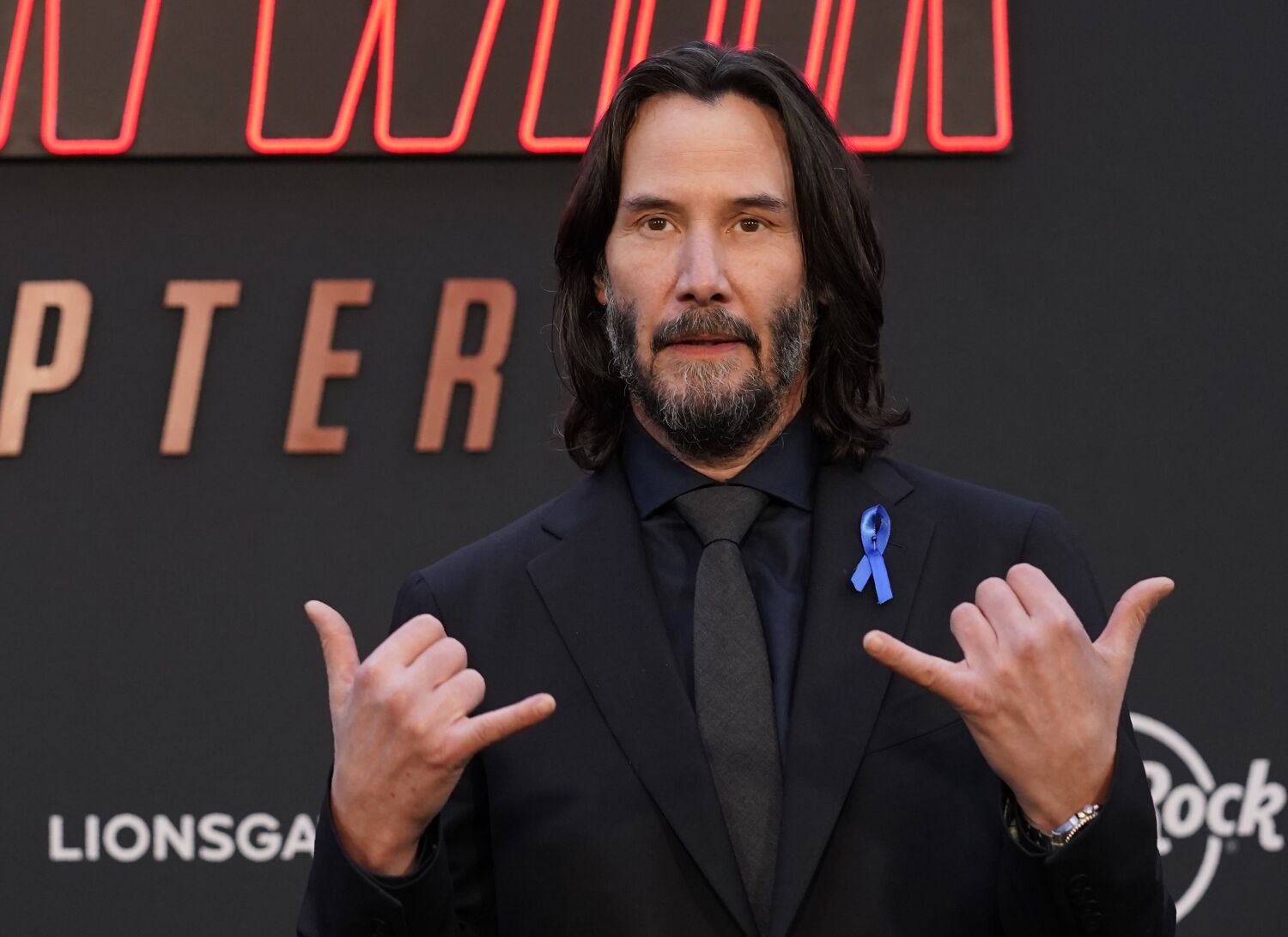 Keanu Reeves saying 'my honey' and customizing tees gives us more reasons to love him