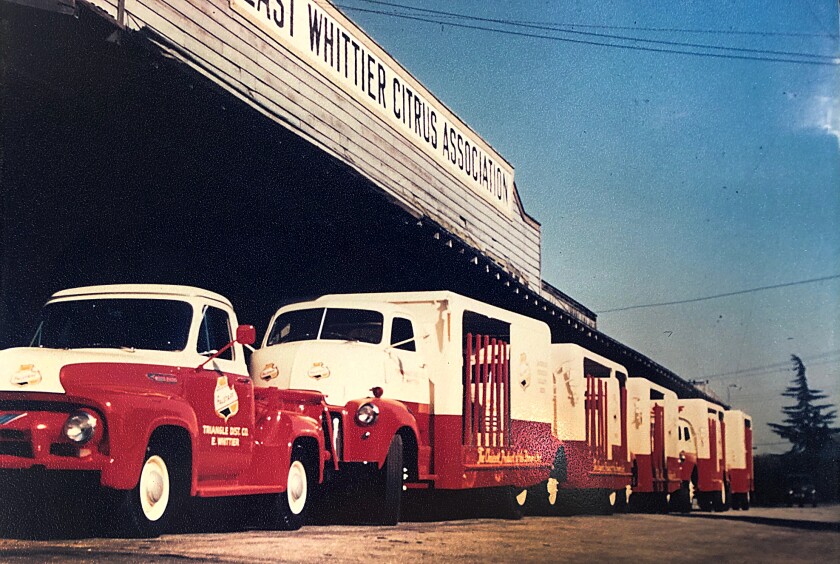 Delivery trucks line up at a warehouse in Whittier.