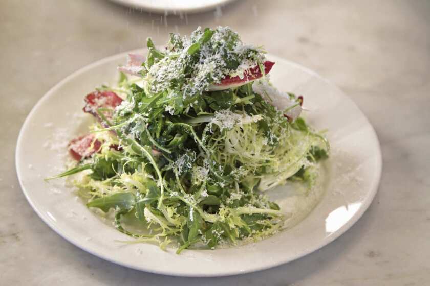 Master chef Nancy Silverton creates a salad named - "Tricolore with Parmigiano-Reggiano and Anchovy Dressing" at Mozza restaurant on Melrose Ave in L.A.