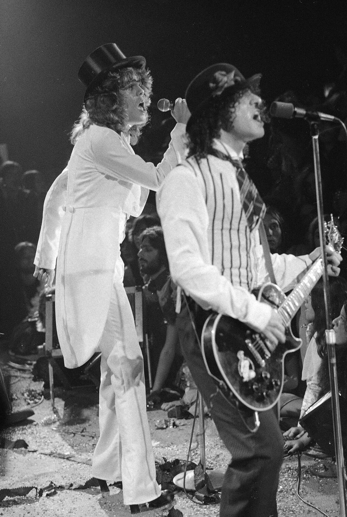 The New York Dolls perform at the Waldorf Halloween Ball in NYC,  1973.