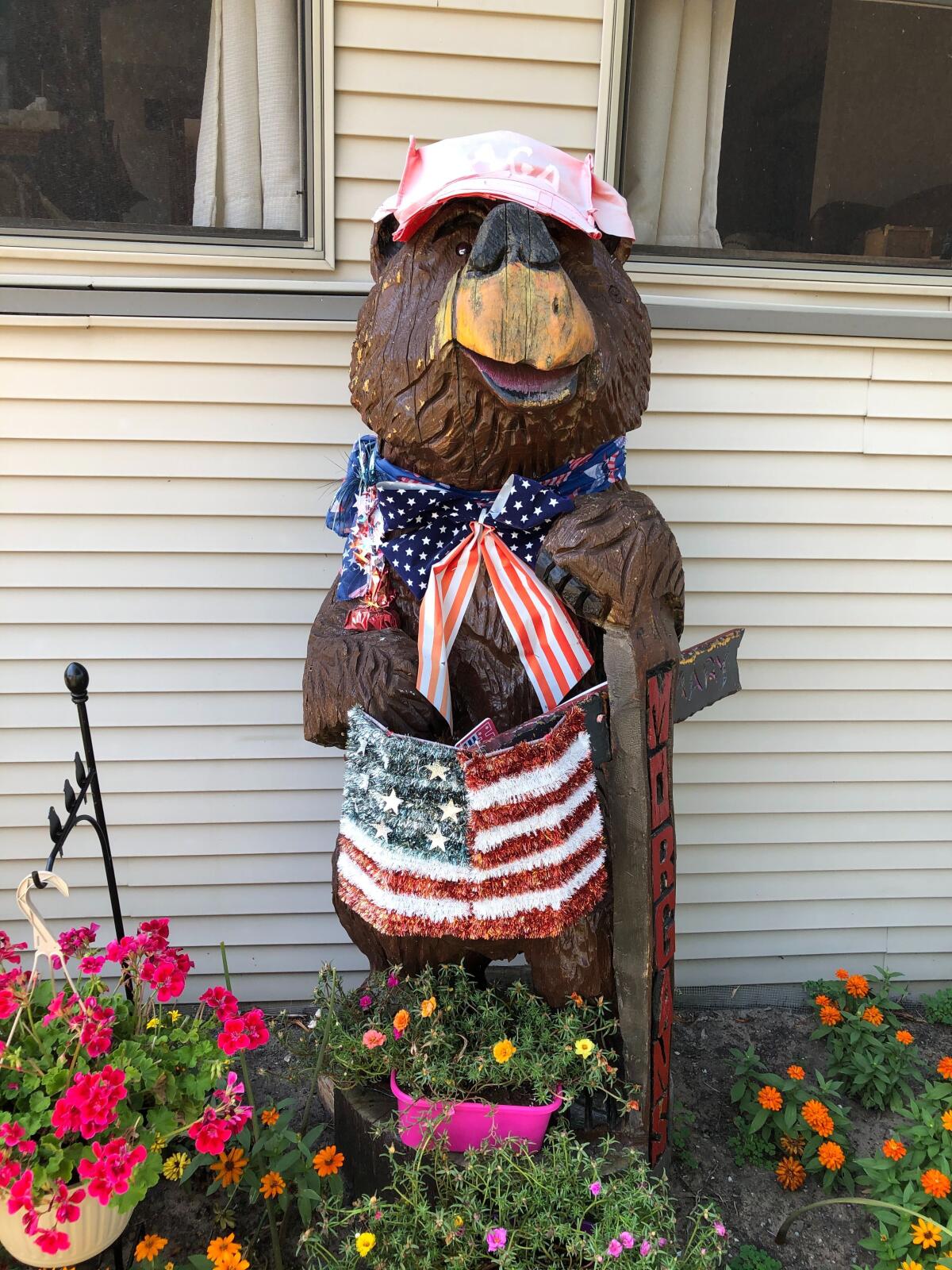 Mary Morgan and her neighbors both like to garden, and have added not just political signs but also lawn ornaments