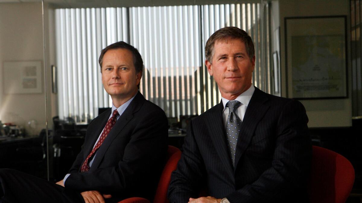 Lionsgate Vice Chairman Michael Burns, left, and CEO Jon Feltheimer in 2010.