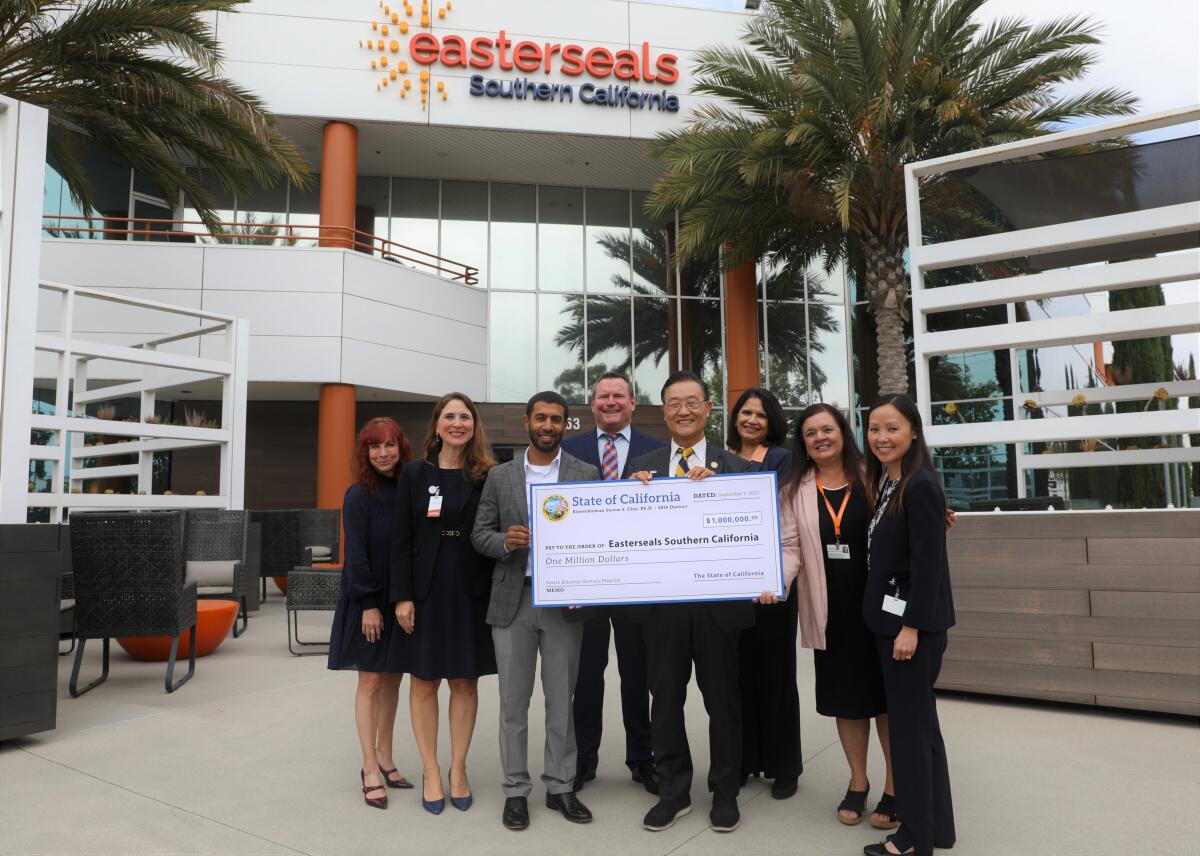 State Assemblyman Steven Choi (R-Irvine) with Easterseals of Southern California officials during a check presentation.