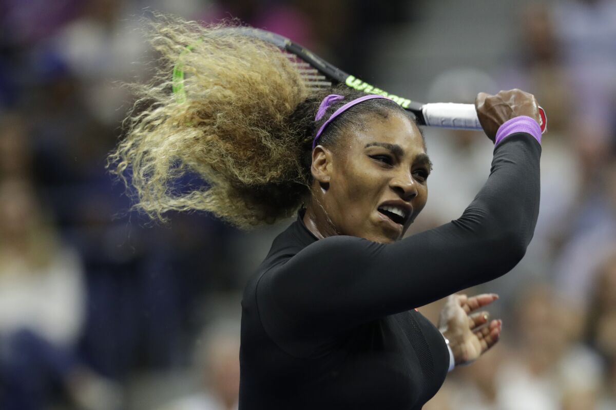 Serena Williams returns a shot during her semifinal victory over Elina Svitolina at the U.S. Open.