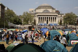 FILE - Student protesters gather inside their encampment on the Columbia University campus, on April 29, 2024, in New York. (AP Photo/Stefan Jeremiah, File)