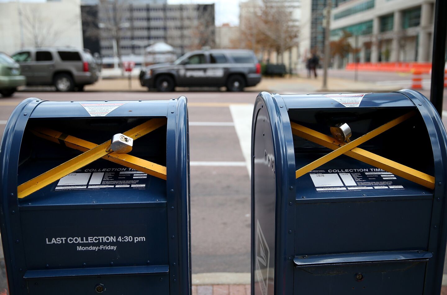 Locks are seen on mailboxes across from the Buzz Westfall Justice Center where the grand jury convened in Clayton, Mo.