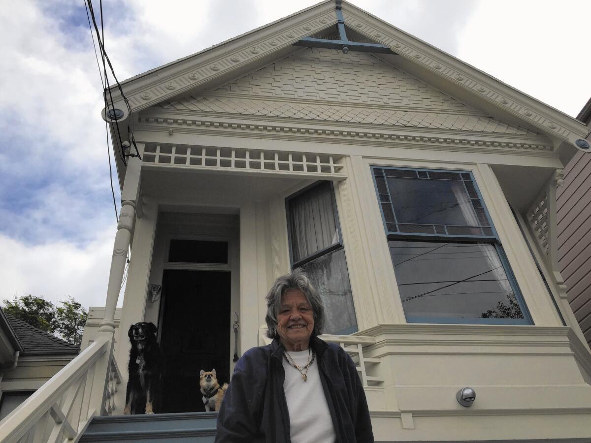 Judith Davis, 71, lives in a Victorian in San Francisco's Noe Valley and says renting out her street-level flat on Airbnb has allowed her to make ends meet.