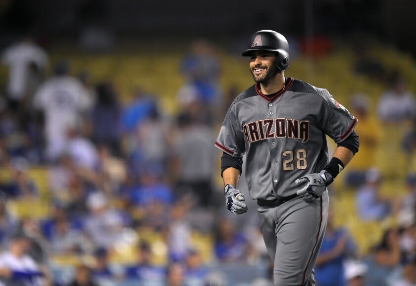 J.D. Martinez is one of several free agents still available as spring training nears.