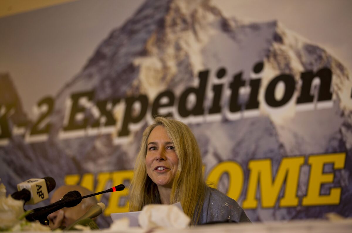 A mountaineer speaks at a news conference