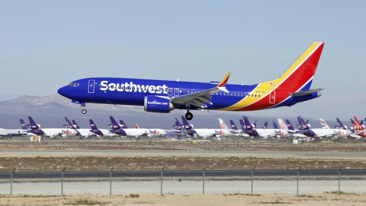 A Southwest Airlines Boeing 737 Max aircraft lands at Southern California Logistics Airport in Victorville on March 23.