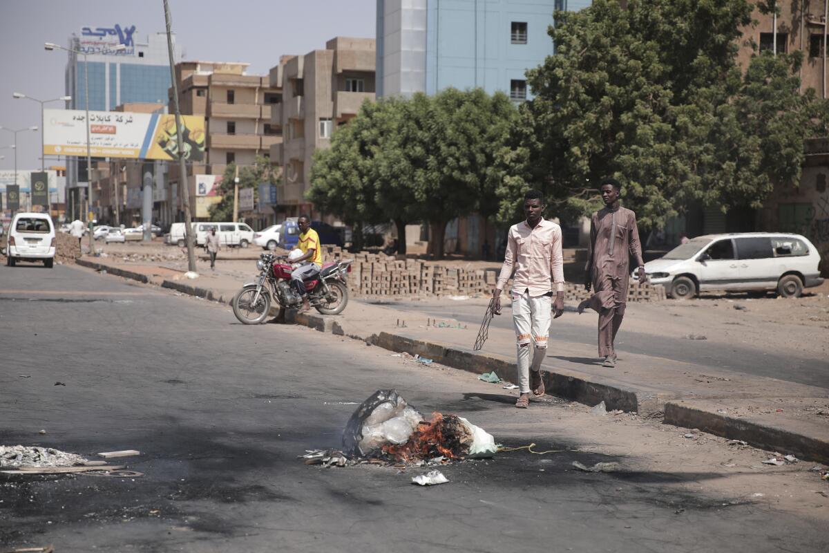 People walking on a street in Khartoum, Sudan