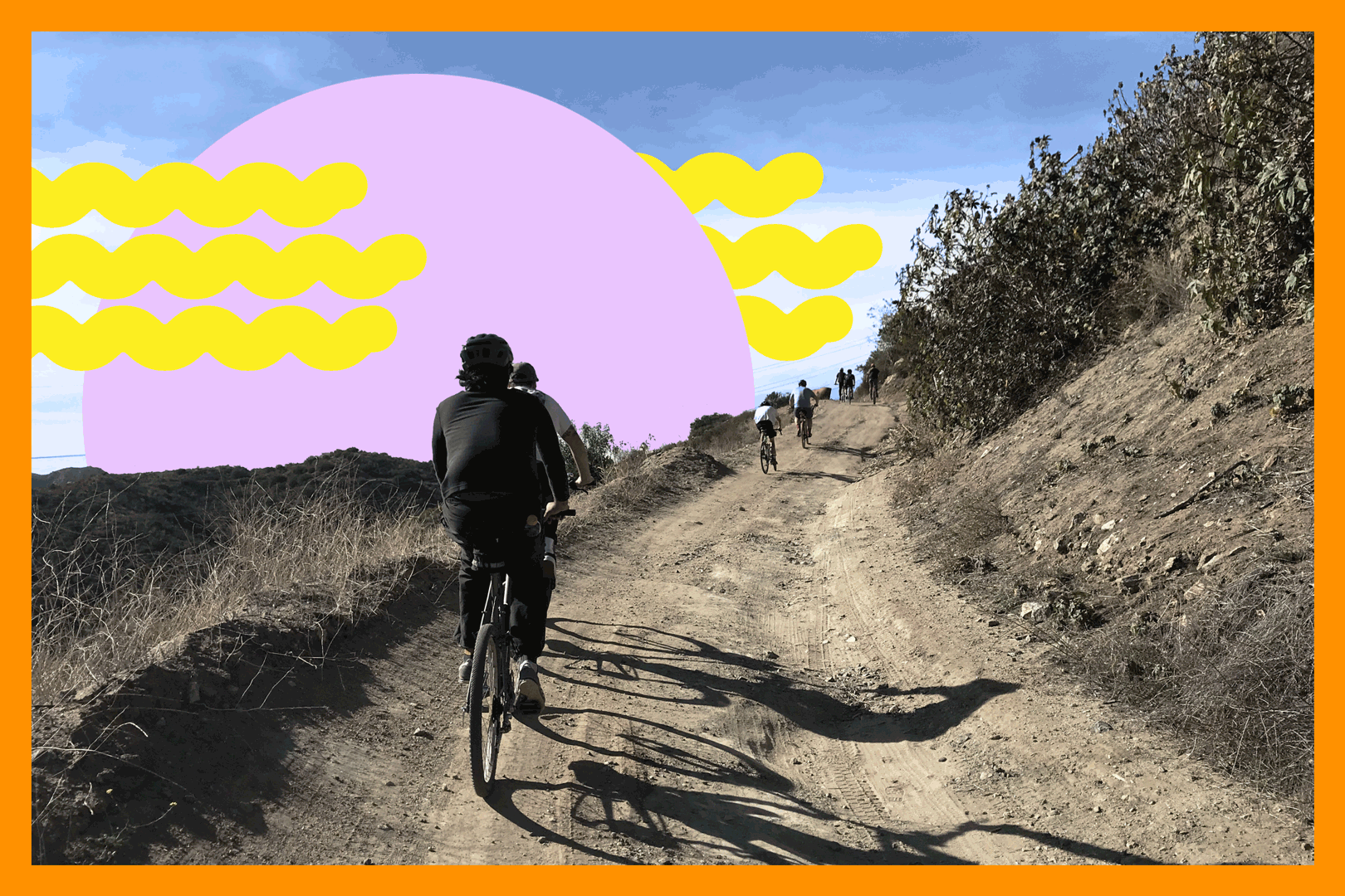 Bicyclists ride along a hillside dirt path.