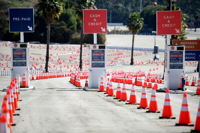 LOS ANGELES, CALIFORNIA FEBRUARY 19, 2021-An empty Dodger Stadium parking sits in the morning sun after the vaccination medicine was delayed due to the harsh weather across the the United States Friday. (Wally Skalij/Los Angeles Times)